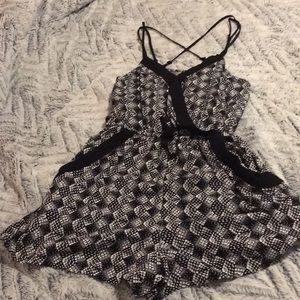 Black and white spaghetti strapped romper.